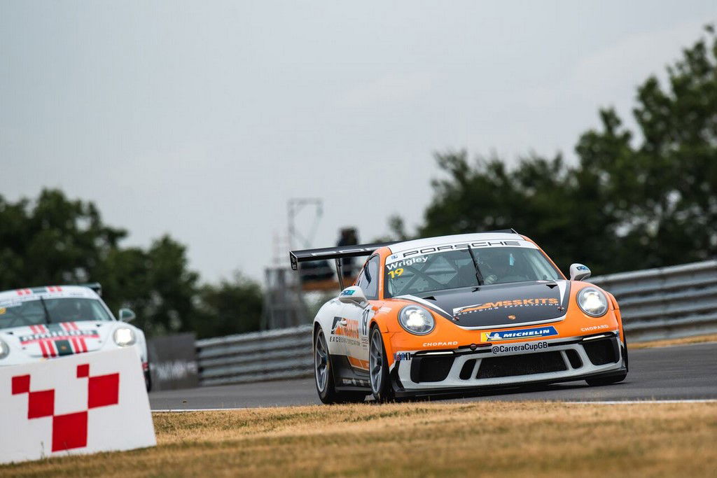 Sutton keeps Cook at bay for race two win